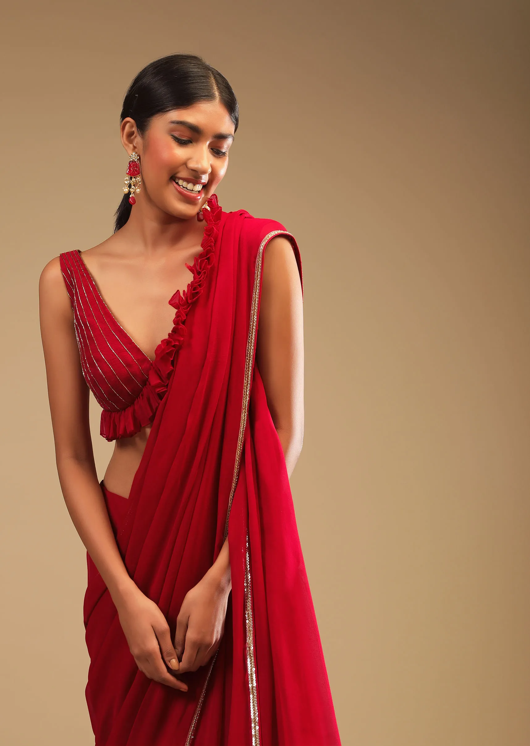 Cherry Red Saree In Georgette With Sequins And Cut Dana Embellished Border And A Ruffle Frill Adorned Crop Top 