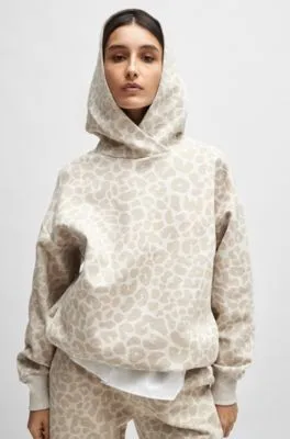 NAOMI x BOSS longline hoodie with leopard pattern