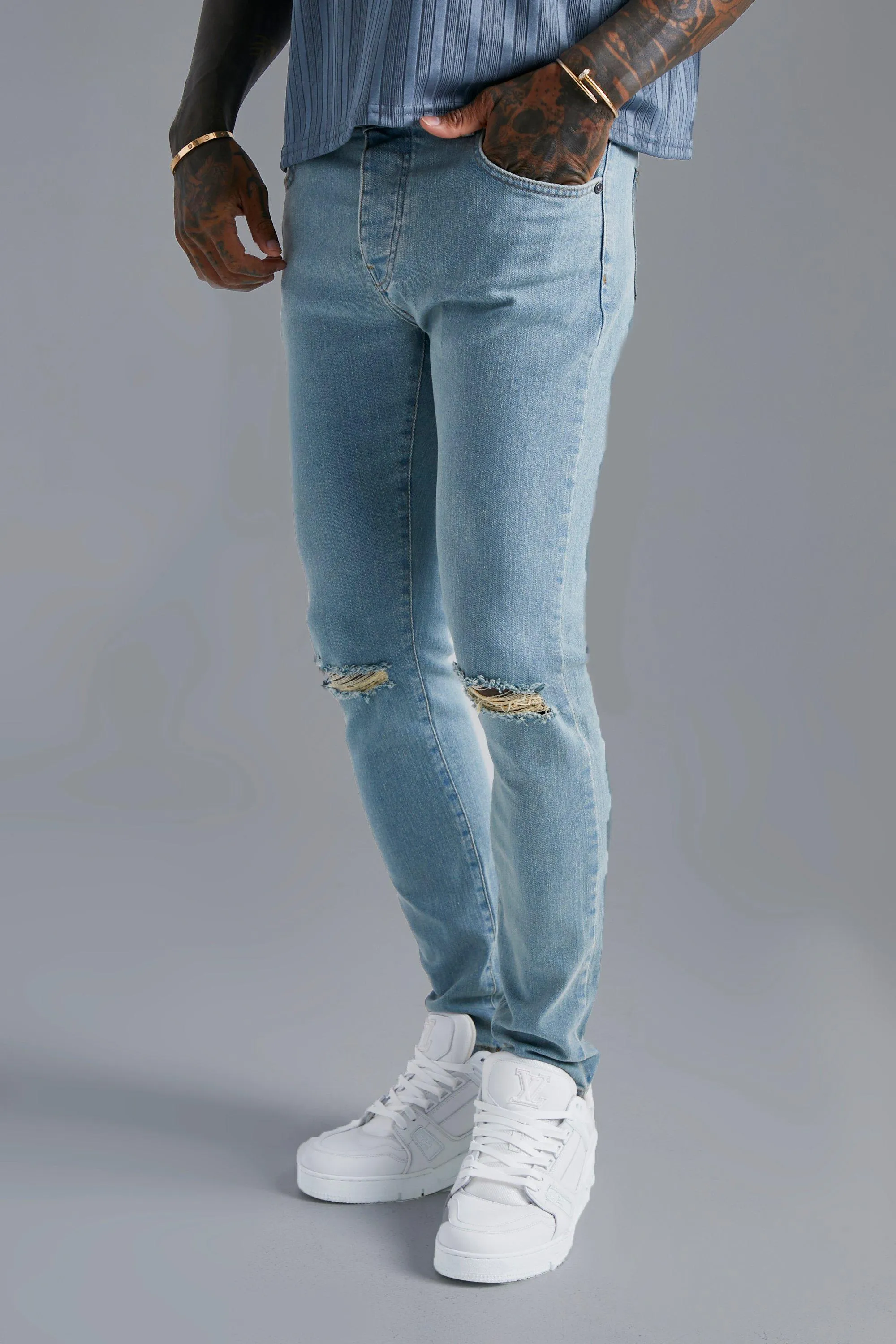 Skinny Stretch Jeans With Slash Knee