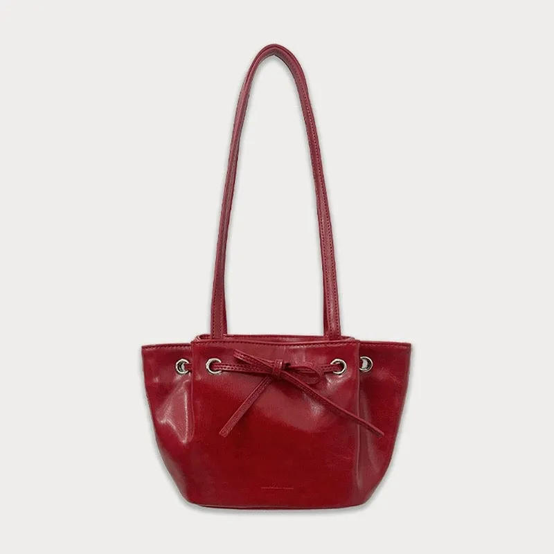 somewherebutterKorean niche dumpling bag bow shoulder handbag commuter armpit bag for women