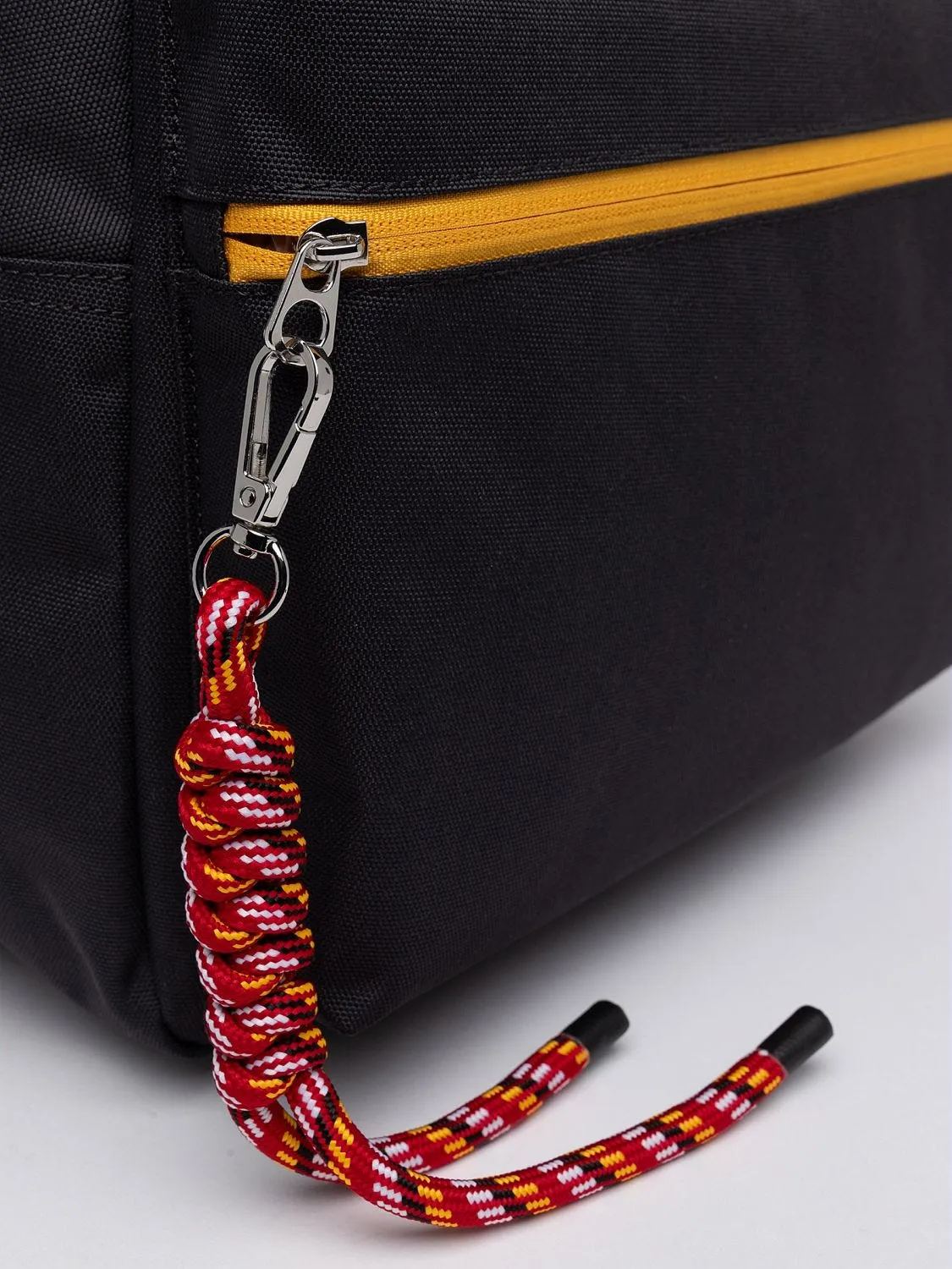 TECHNICAL FABRIC BACKPACK WITH PENDANT DETAIL