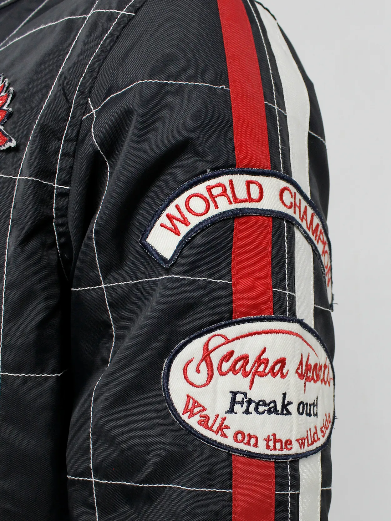 Walter Van Beirendonck for Scapa dark blue ‘Formula 1’ jacket with red stripes and patches