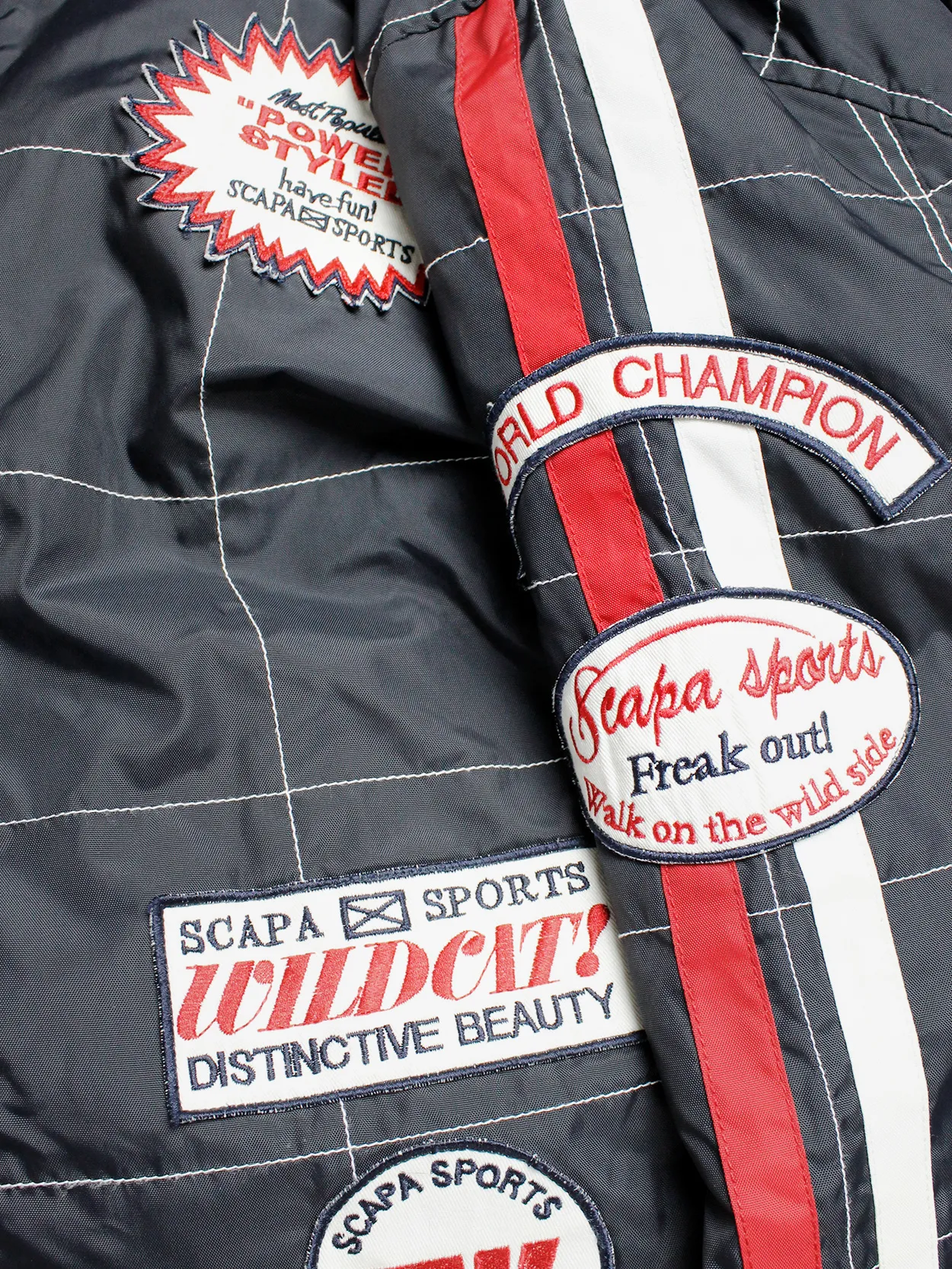 Walter Van Beirendonck for Scapa dark blue ‘Formula 1’ jacket with red stripes and patches