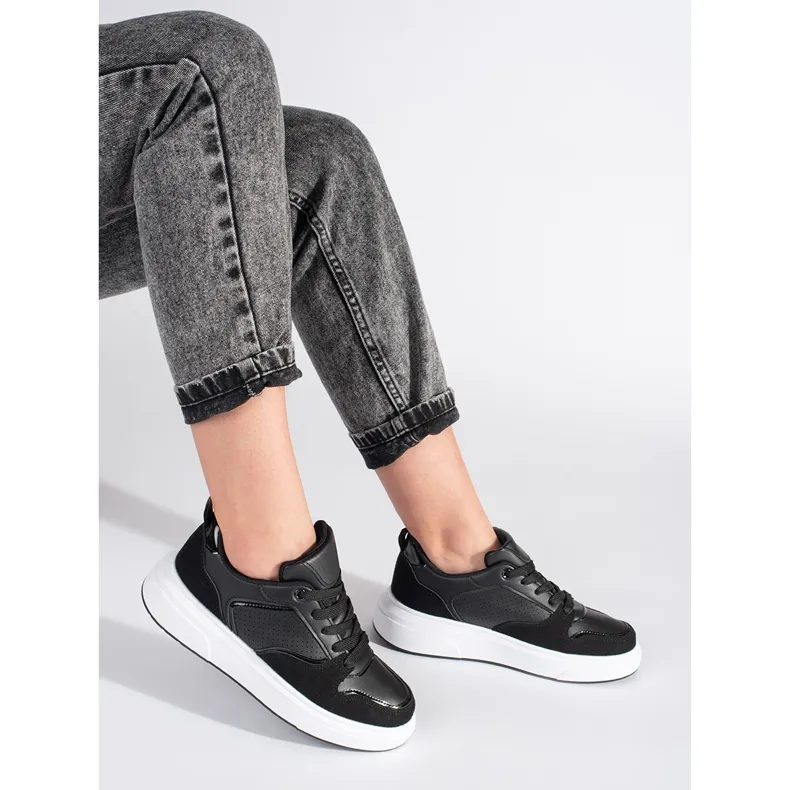 Women's black sneakers with a thick sole